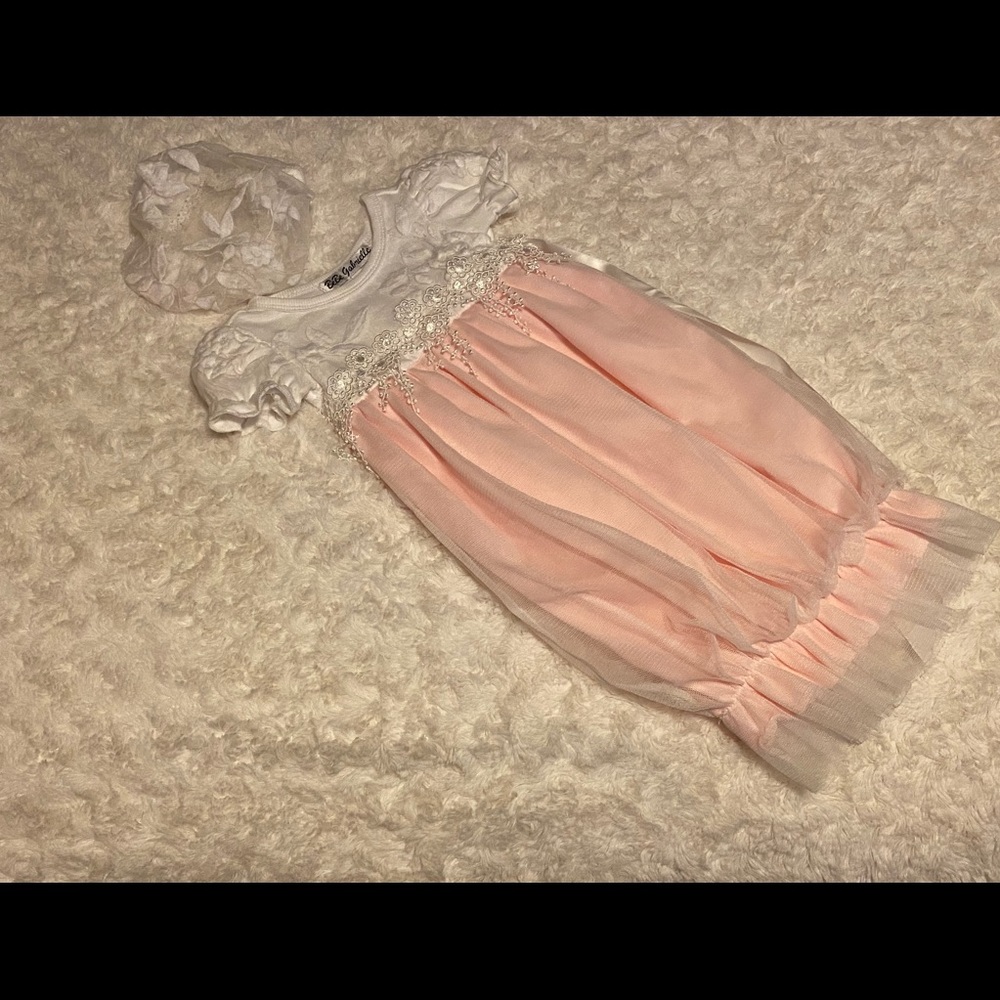 Bebe Gabriel gown and lace hat